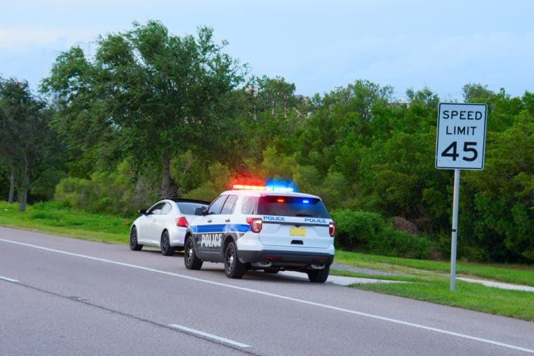 Police truck suv vehicle with flashing red and blue lights